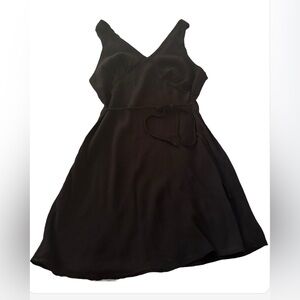 Elegant Black Women's Dress size. With tie string for waist. Large and NWOT!